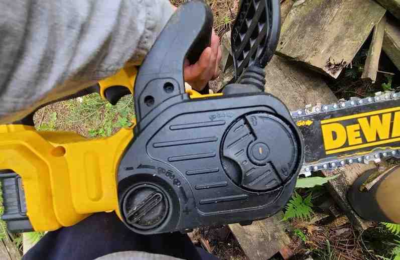 how to adjust belt tension on a chainsaw